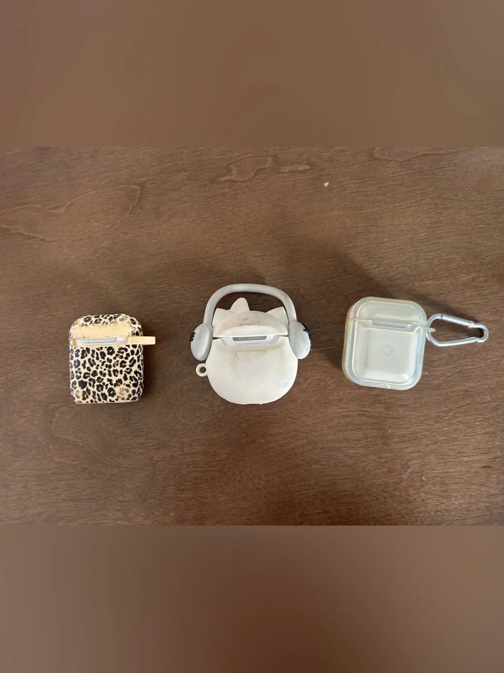 3 pairs of airpods with cases
